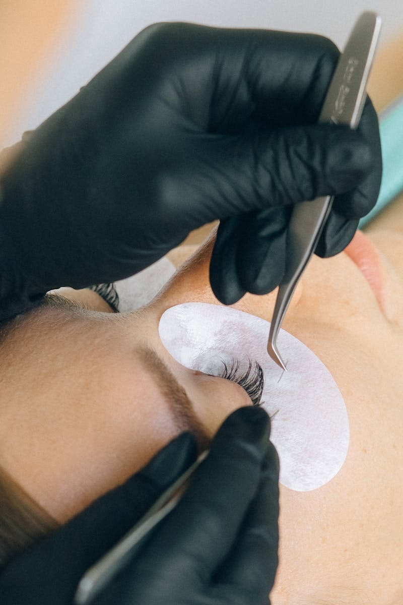 Woman enjoying a tropical vacation with flawless eyelash extensions