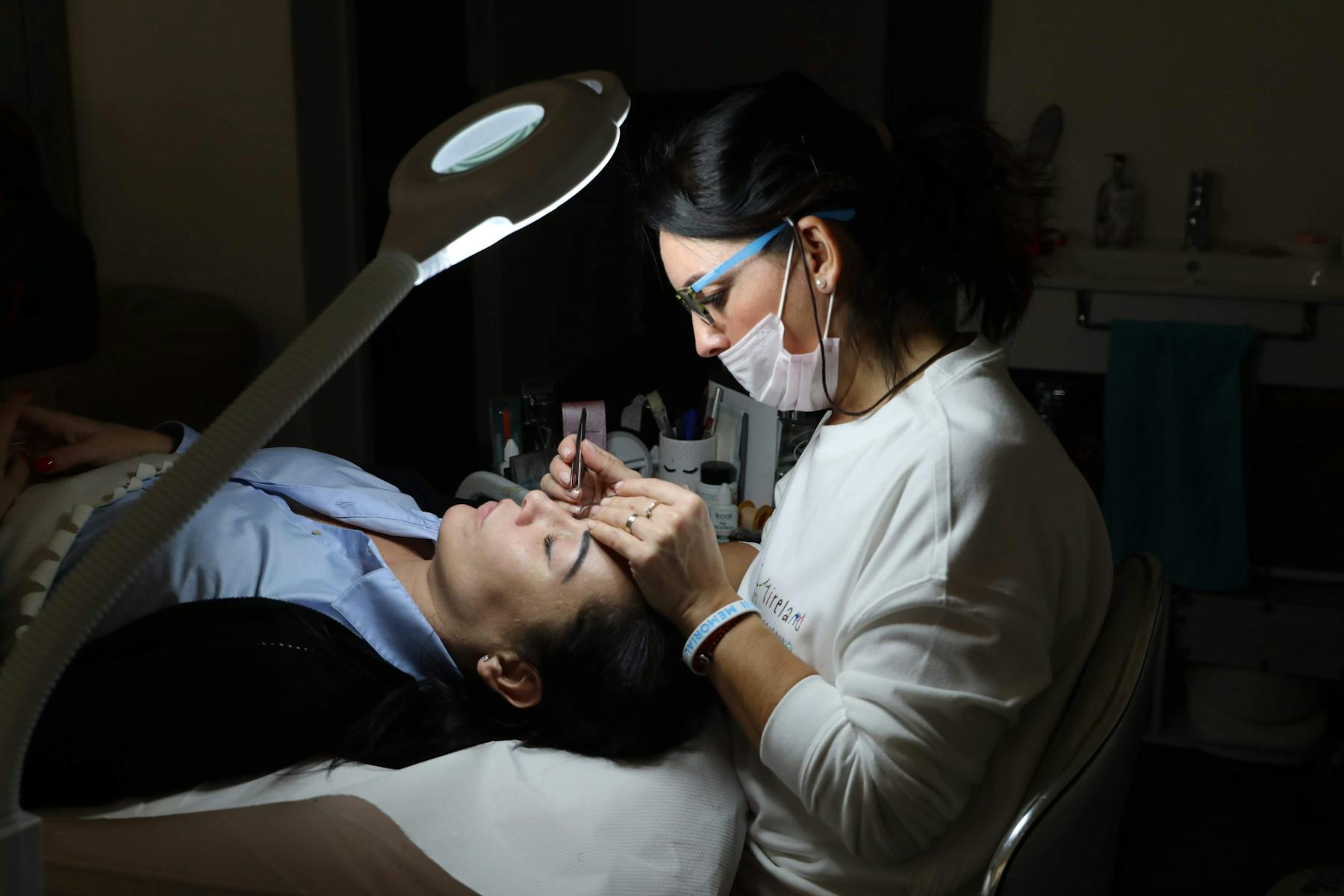 A professional and luxury beauty setup, representing the value and quality investment of permanent makeup