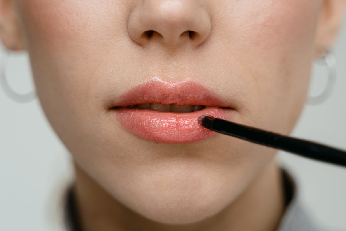 A beautiful comparison of lip volume and color enhancement through fillers and blushing