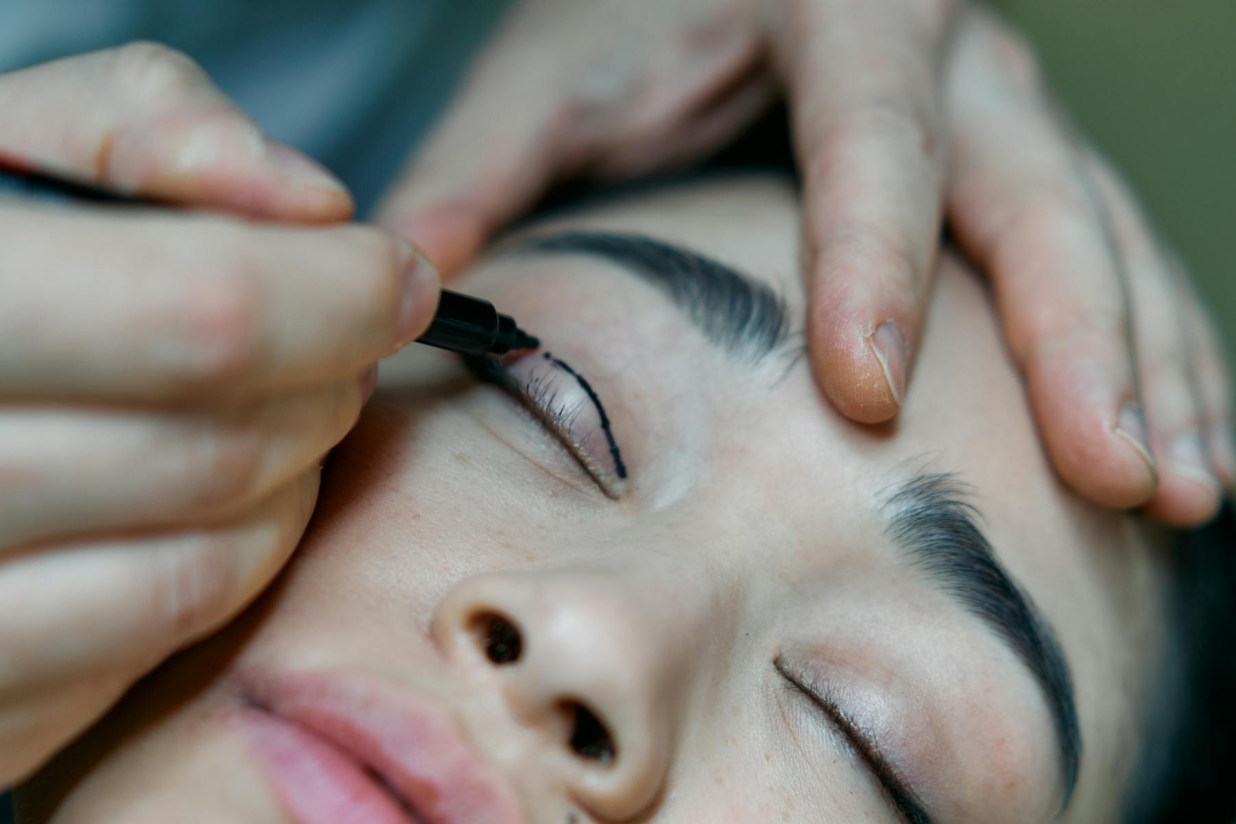 A close-up view of beautifully defined permanent eyeliner showcasing crisp lines and lash enhancement