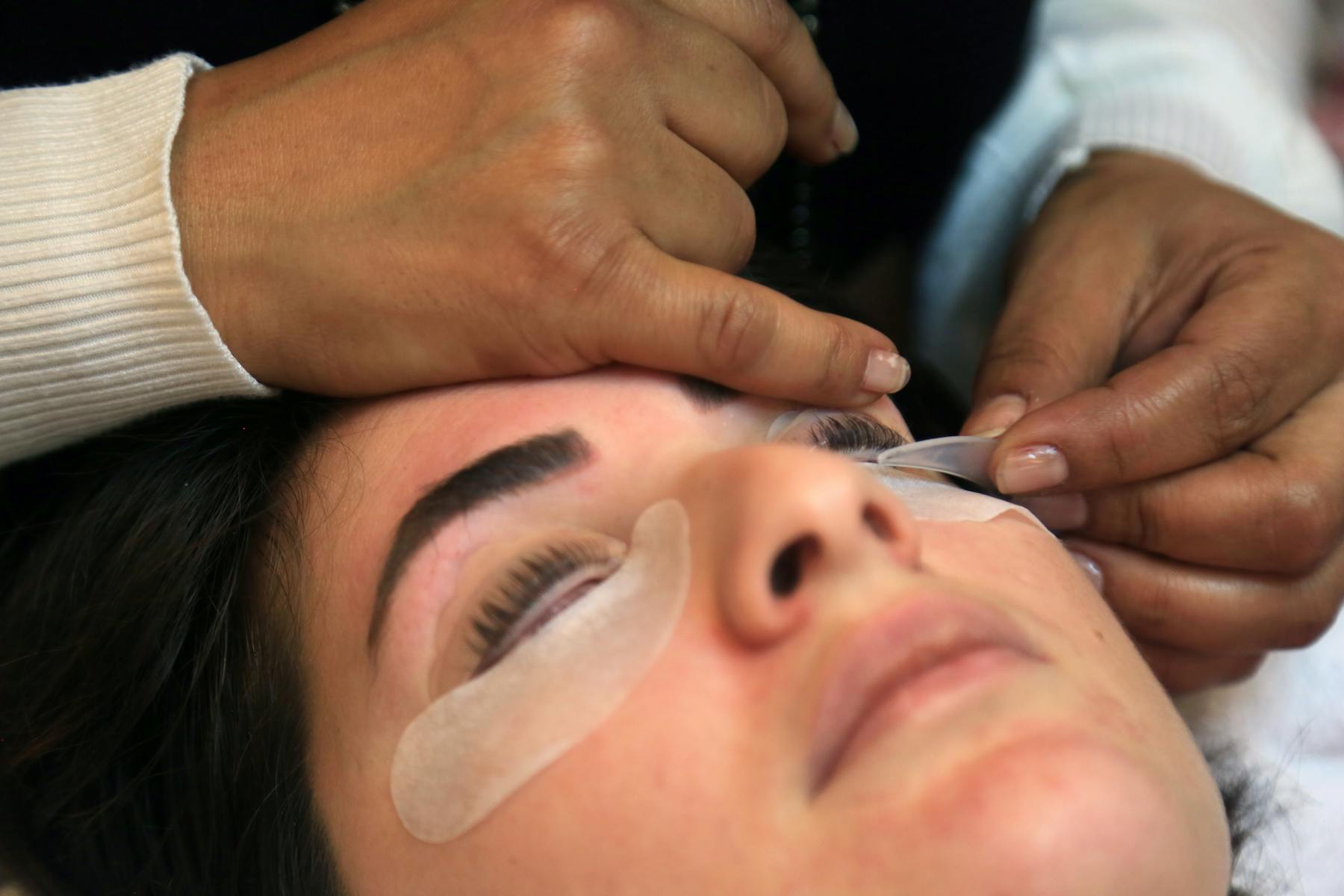 A close-up view of a beautifully textured hybrid lash extension set